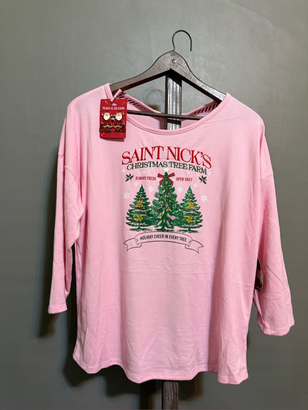 Magical seasons Christmas Tree Farm Pink Holiday Tee, with Santa earrings.